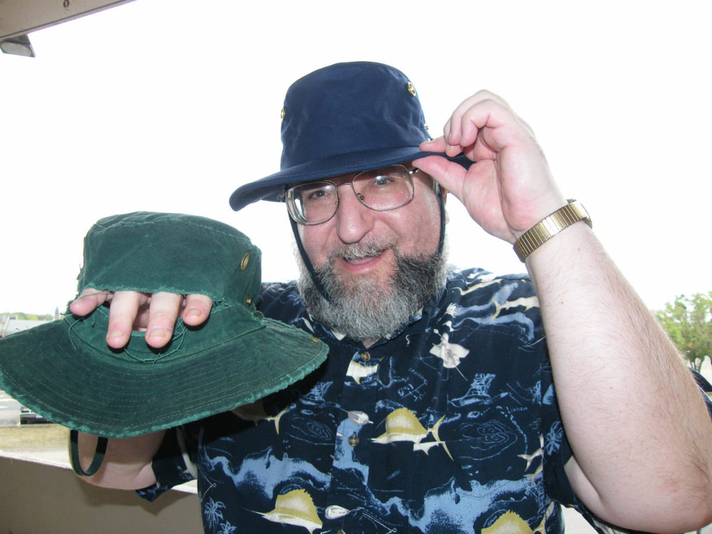 David E Romm with his tilley hats
